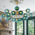Modern Teal Glass Globe Chandelier with Brass Finish