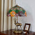 warm light 1990s style tiffany bedside table lamps.jpg